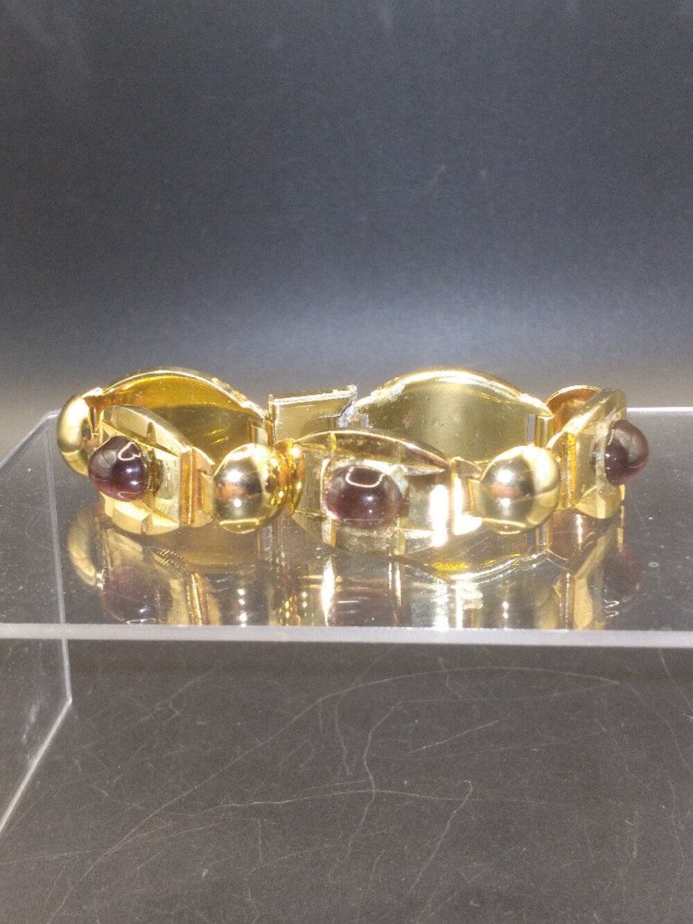 Gold tone fold over clasp Purple Glass Cabochons Bracelet